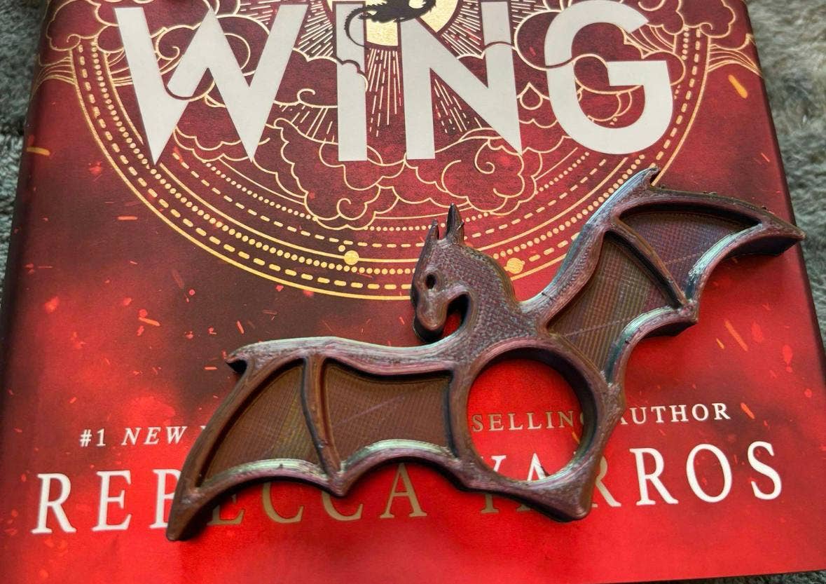Dragon page holder