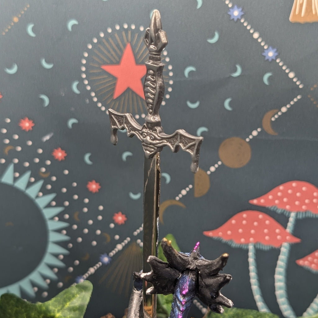 Dragon with Sword Figurine