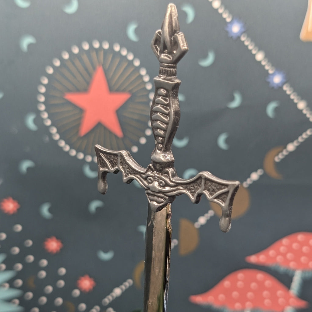 Dragon with Sword Figurine